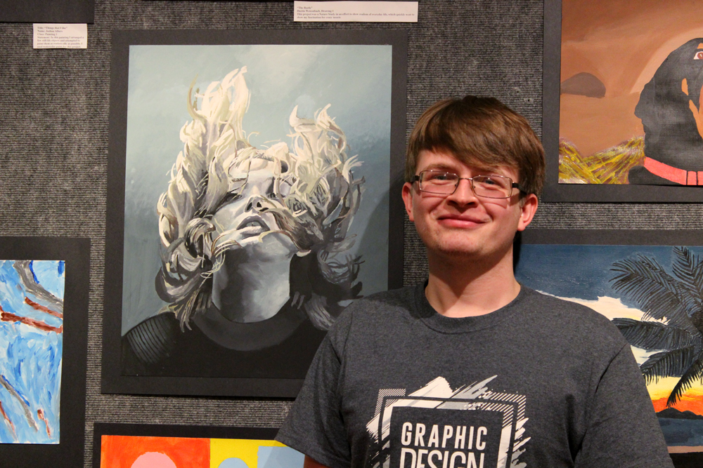 Krystian Stafford with winning artwork